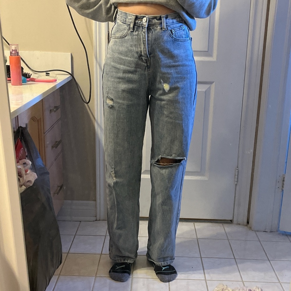 High waisted distressed blue washed jeans